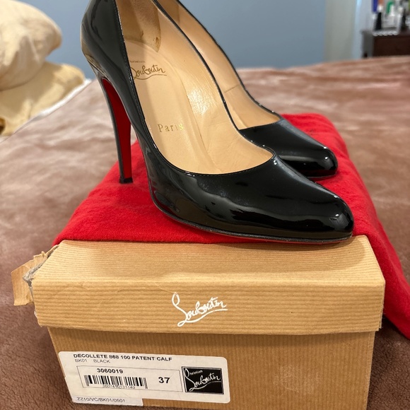 Christian Louboutin - Picture 1 of 7